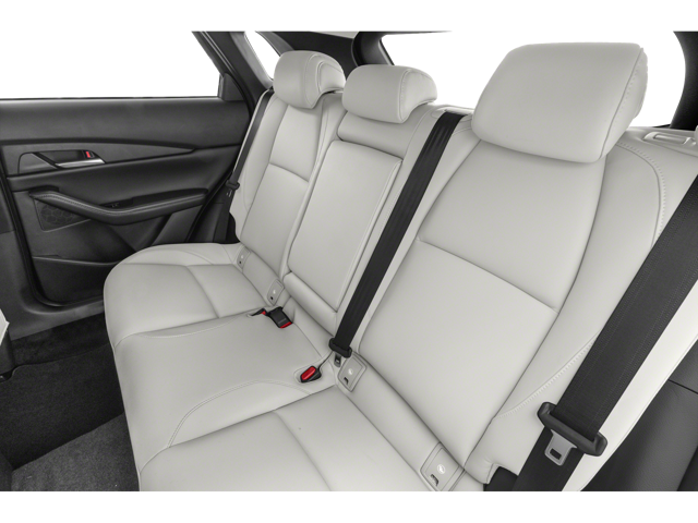 rear seats with white upholstery of a 2024 mazda cx-30