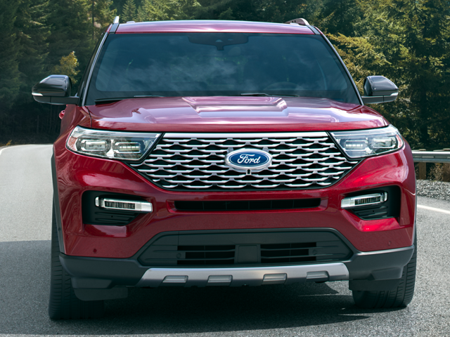 An aggressive front profile of a red 2024 Ford Explorer
