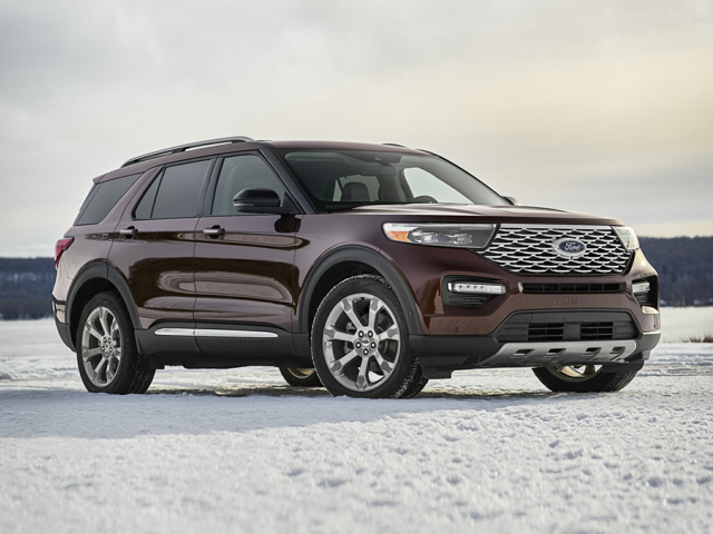 An all-new Maroon 2024 Ford Explorer XLT parked in a snowy field around Norwood, MA.